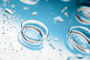 contact lenses with droplets around close up view  - Image