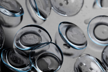 contact lenses on dark background close up view   - Image