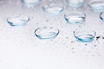 contact lenses with droplets around close up view  - Image