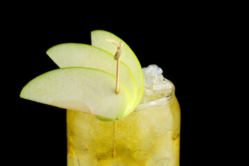 pear cocktail or lemonade with ice on black background, bar concept. Fresh Pear Cocktail close up