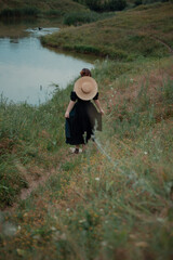 young girl walking in the field 