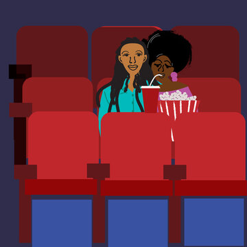 Lesbian couple watching a movie at the movie theater