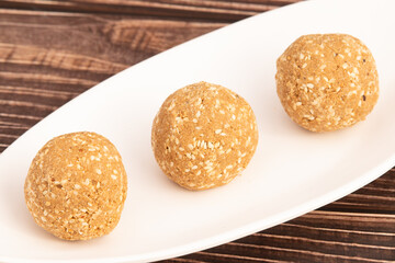 Indian Mithai Known As Tilgul Ladoo, Gajak Laddu, Gajjak Laddoo, Gazak Or Gachak Is Made Of Sesame Seeds Til, Gur Or Gud Mixed With Roasted Mugfali, Kaju, Badam, Pista, Moongfali And Honey Shahad