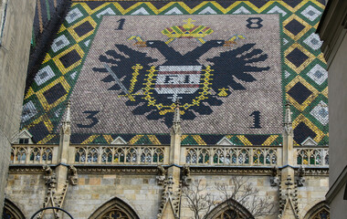  Coat of Arms at St. Stephen Cathedral in Wien,double-headed eagle, side view of Stephansdom