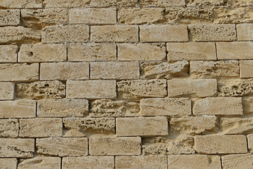 Muratura portante in tufo di una struttura antica