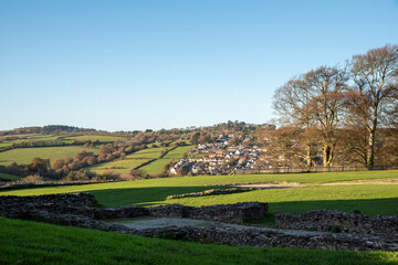 Fototapeta na wymiar Launceston, Cornwall, England, UK 2021. North Launceston rural housing ajoining farmland view from grounds of Launceston Castle,