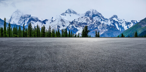 Empty road and snow mountain nature background