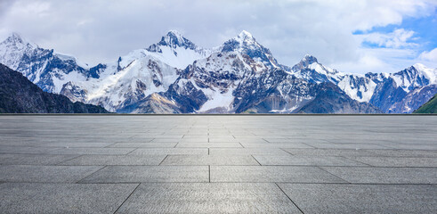 Empty square floor and snow mountain background - Powered by Adobe