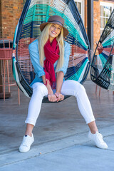 A Lovely Blonde Model Poses In Her Beautiful Fall Clothing