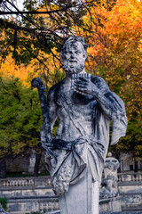 Statue of Pan, Gardens of the Fountain (Jardins de la fontaine) in autumn, Nîmes, France