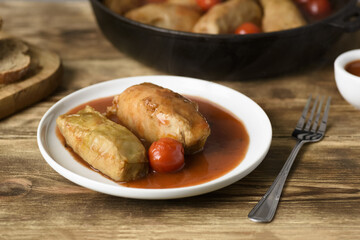 stuffed cabbage, rice and minced meat with tomato sauce