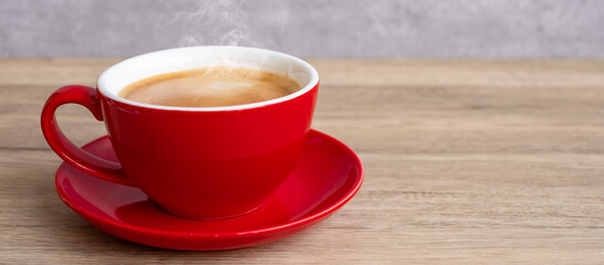 Hot espresso coffee on table, Red coffee cup in cafe or home.Top view with blank copy space for your text.