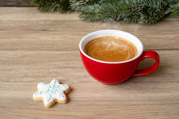 Merry Christmas with homemade cookies and coffee cup on wood table background. Xmas eve, party, holiday and happy New Year concept