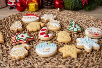 Obraz na płótnie Canvas Merry Christmas with homemade cookies on wood table background. Xmas, party, holiday and happy New Year concept
