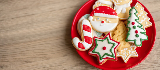 Merry Christmas with homemade cookies on wood table background. Xmas, party, holiday and happy New Year concept