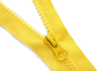 Yellow zipper on white background, top view © New Africa
