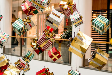 Christmas decoration at shopping centre. Festive season. Holiday shopping. Christmas presents gifts