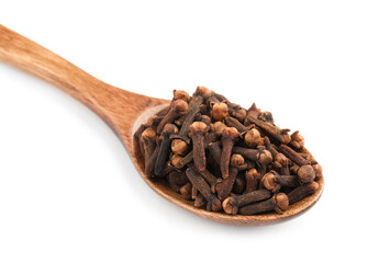 Wooden spoon with aromatic dry cloves isolated on white, closeup
