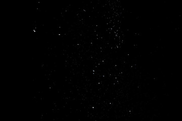 snow overlay photo on black. abstract snow texture to give a winter season effect. realistic effect of the heavy snowfall.