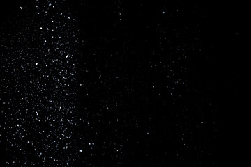 snow overlay photo on black. abstract snow texture to give a winter season effect. realistic effect of the blizzard.