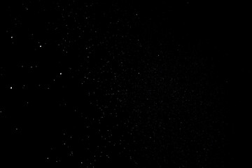 snow overlay photo on black. abstract snow texture to give a winter season effect. realistic effect of the snowfall.