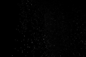 snow overlay photo on black. abstract snow texture to give a winter season effect. realistic effect of the blizzard.