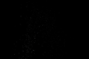 the snowfall photo overlay in realistic. abstract snow texture on black to give a winter season effect. realistic effect of the snowfall.