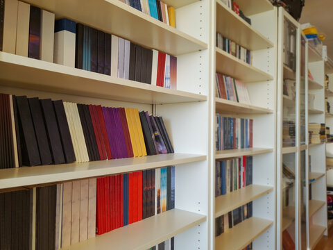 Books Lined Up Side By Side In The Library. Close Up