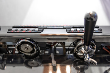 Close-up detail of a professional coffee machine.