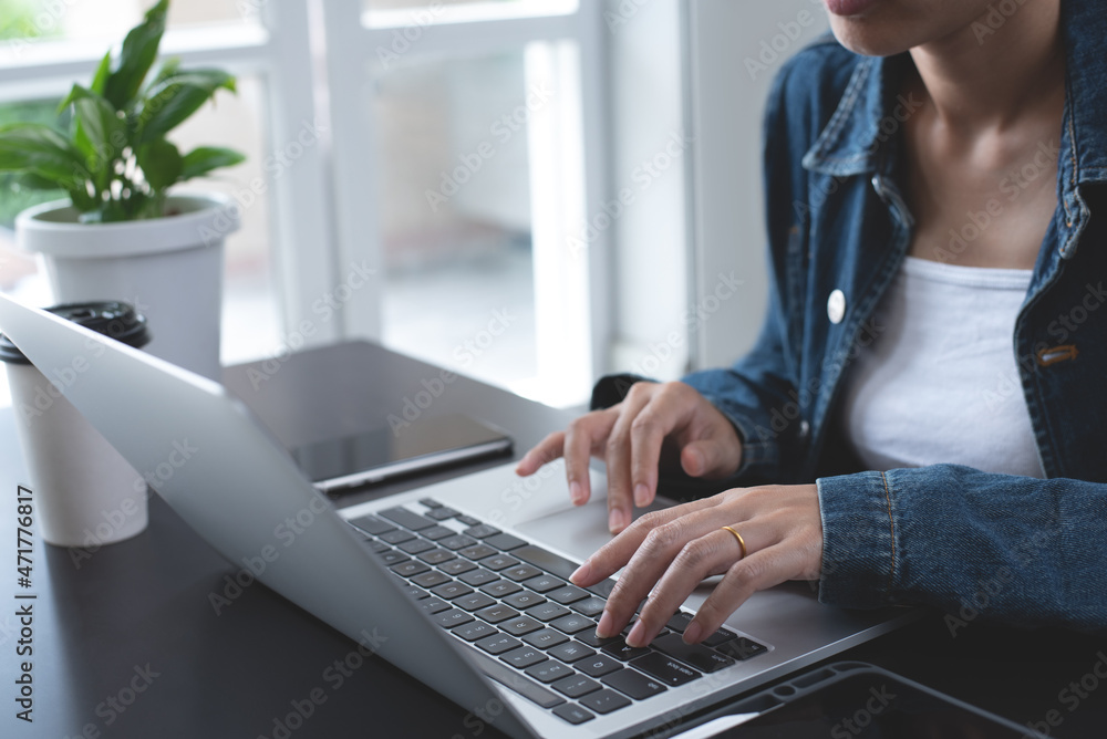 Canvas Prints close up of asian business woman hands typing on laptop computer keyboard, online working from home 