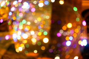 Obraz premium colorful bokeh background happy new year 2022. abstract effect light night out of focus circle wallpaper. for christmas party celebration holidays or technology background concept.