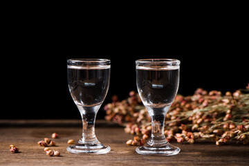 chinese liquor or spirits in glass cup on table