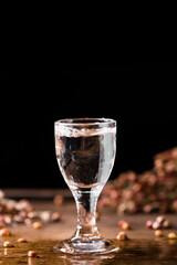 chinese liquor or spirits in glass cup on table
