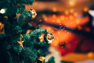 New Year concept,Close up of balls on christmas tree. Bokeh garlands in the background.