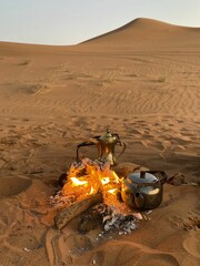 Making Arabic Coffee in the Desert © OmarA