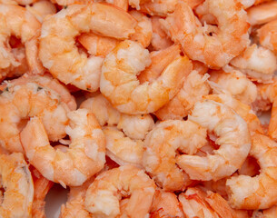 Peeled red shrimp meat as background.