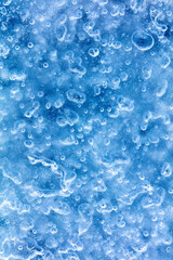 Blue crystals of snow and ice as an abstract background.