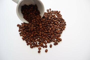 Coffee beans, White Cup and saucer on white background. coffee, Cafe, shop design elements. 