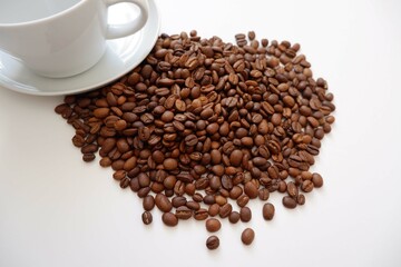 Coffee beans, White Cup and saucer on white background. coffee, Cafe, shop design elements. 