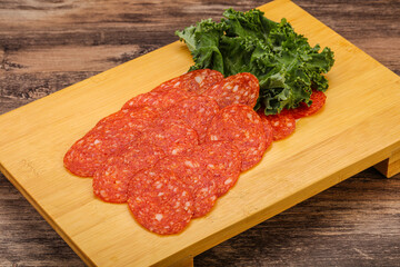 Italian spycy pepperoni sausage slices