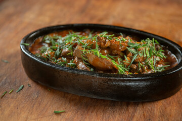 Korean spicy food on a plate,meat with vegetables and onion