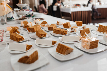 beautifully set table at a wedding banquet with delicious food and alcohol