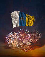 Holiday fireworks and flag of Canary Islands