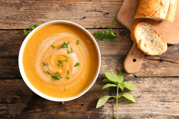 pumpkin soup with bread slice- top view