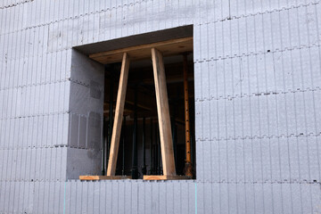 Construction of a passive house from durable and warm polystyrene blocks
