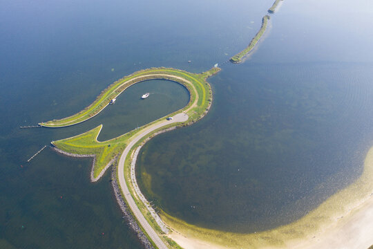 Aerial view of Tulpeiland in Wolderwijd off the coast of Zeewolde, artificial peninsula in the shape of a tulip. The elongated natural islands form the trunk. Zeewolde, Flevoland, the Netherlands