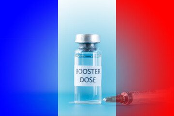 booster dose of coronavirus vaccine on French flag background,third stage of vaccination in France