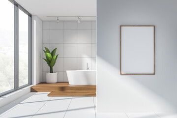 White bathroom interior with bathtub near window, mockup poster