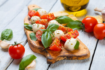 Italian caprese salad with mozzarella cheese