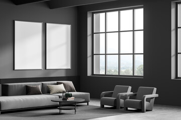 Dark living room interior with two empty white posters, armchairs